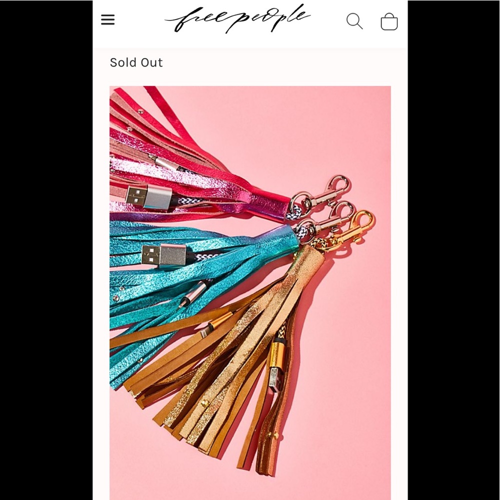 Free people leather iPhone charger keychain. New.‎